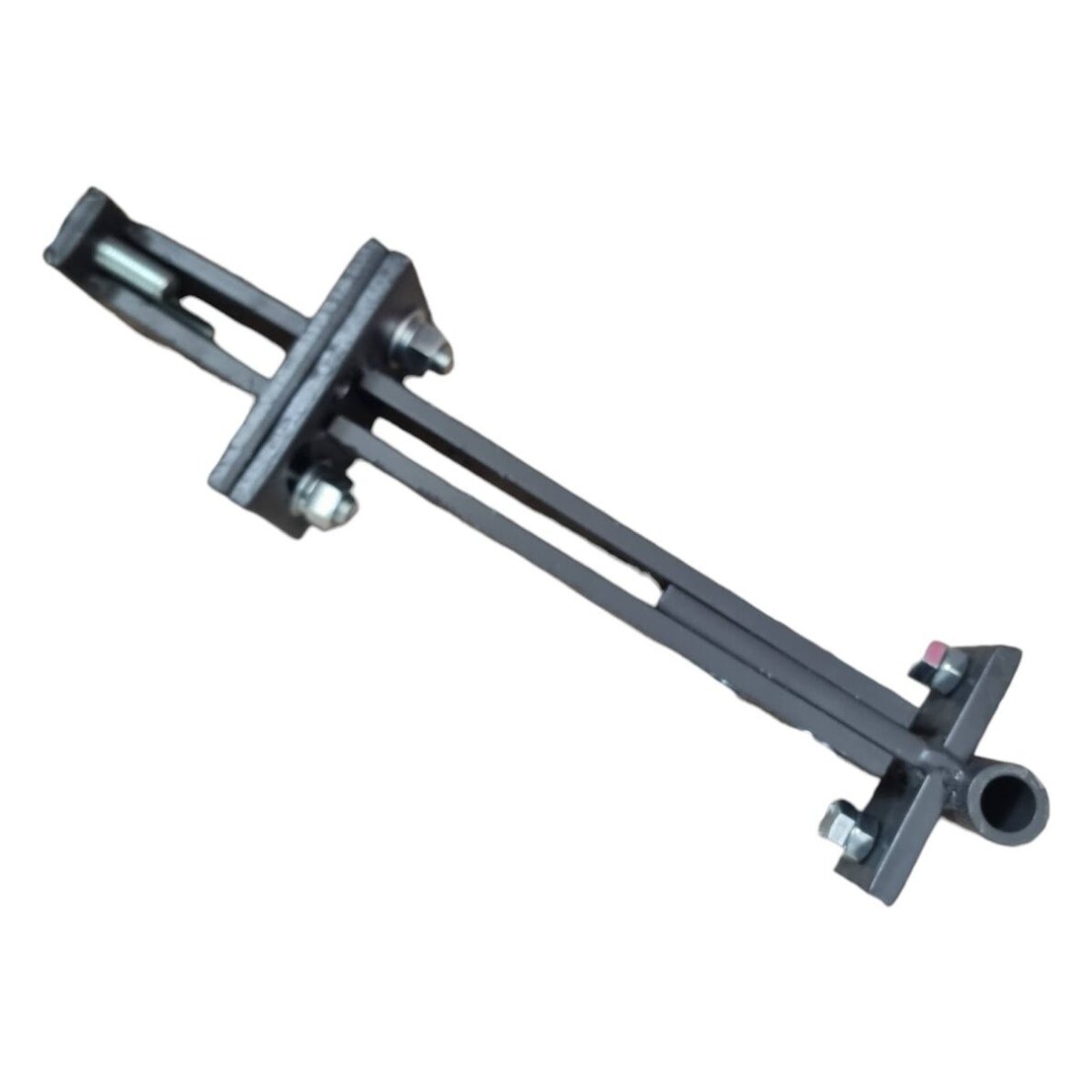Universal, adjustable coupling mechanism for tiller implements